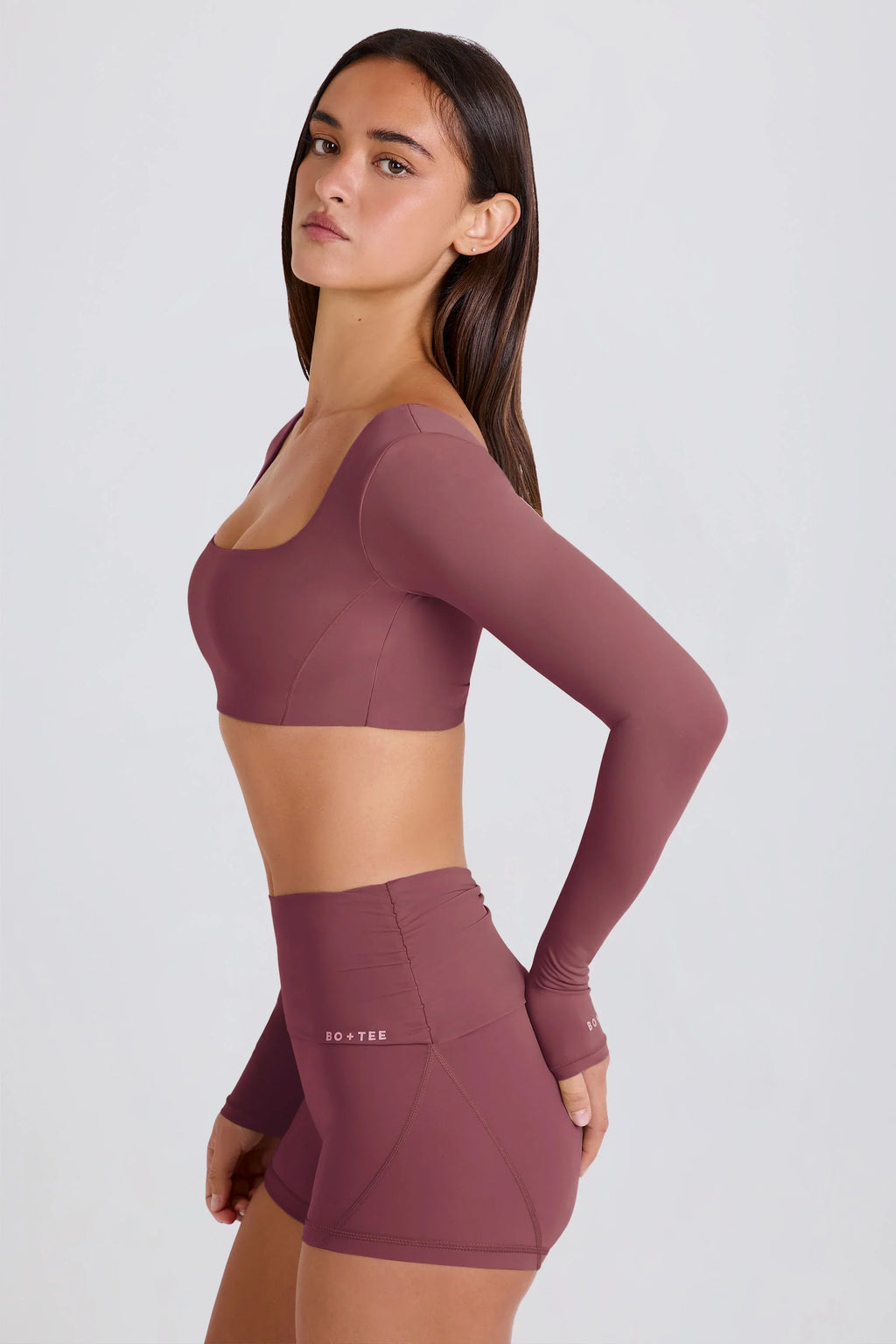 Four-Way Stretch Foldover Mid-Rise Mini Shorts in Acai