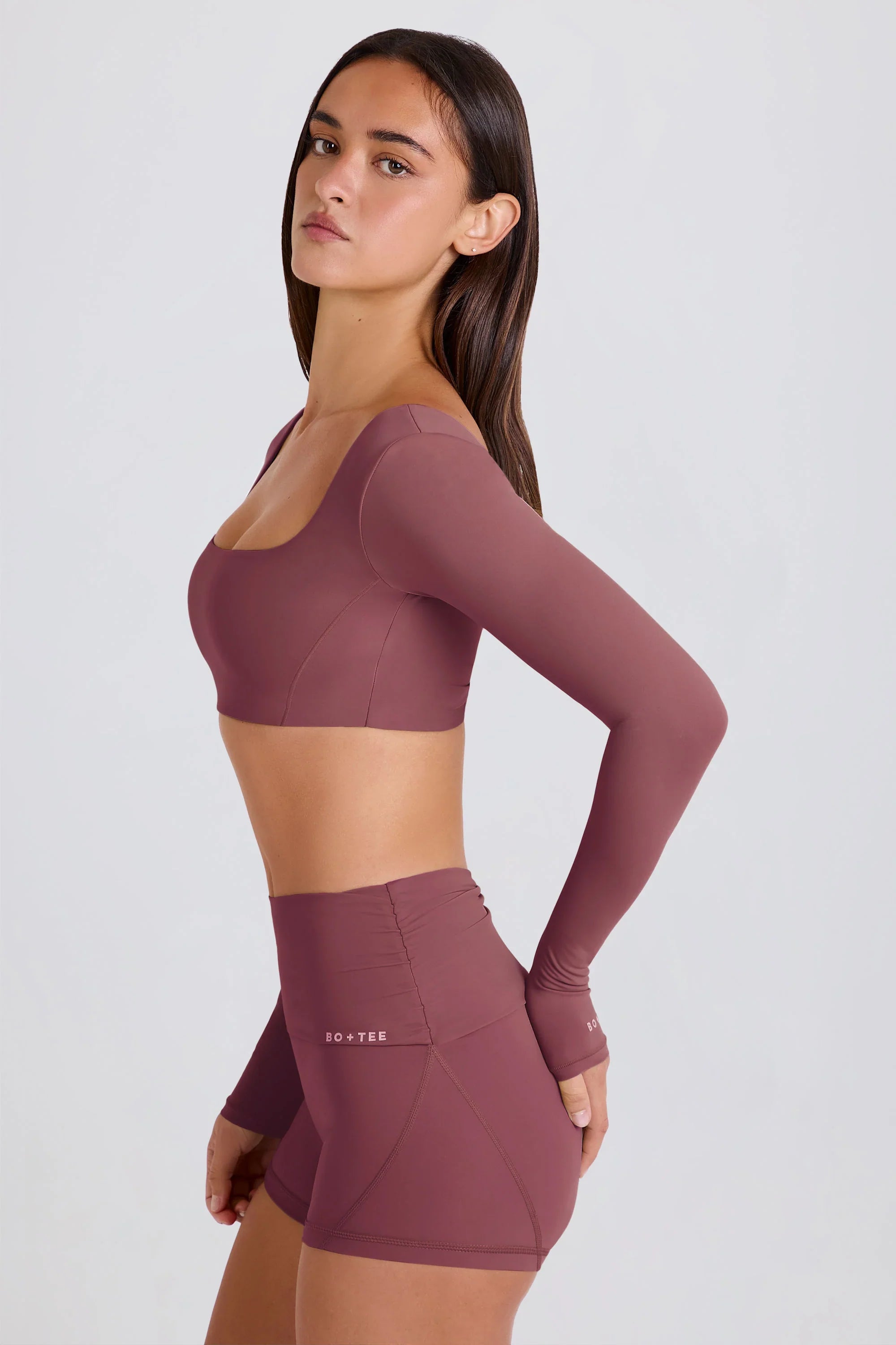 Four-Way Stretch Foldover Mid-Rise Mini Shorts in Acai