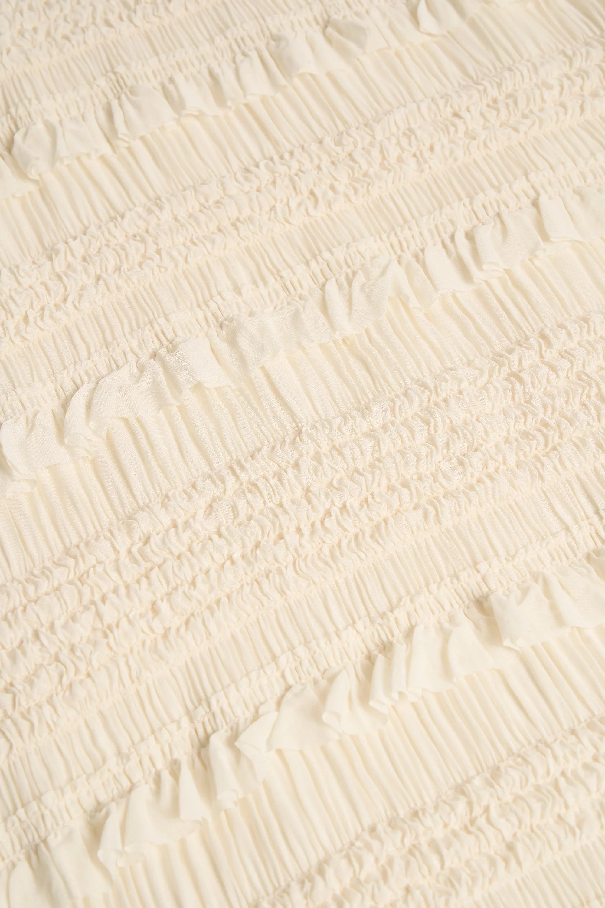 Ruffled Mid-Rise Shorts in Ivory